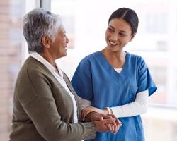 Hình ảnh về Healthcare professional assisting a patient