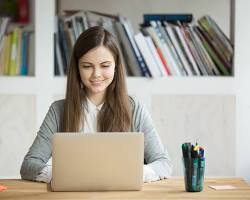 Hình ảnh về Student studying online on laptop at home