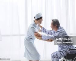 Hình ảnh về Nurse in training assisting a patient