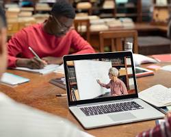 Hình ảnh về Students studying online on laptops