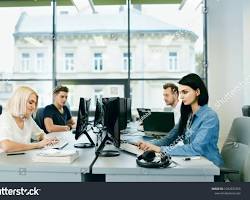 Hình ảnh về People working in a modern office with computers